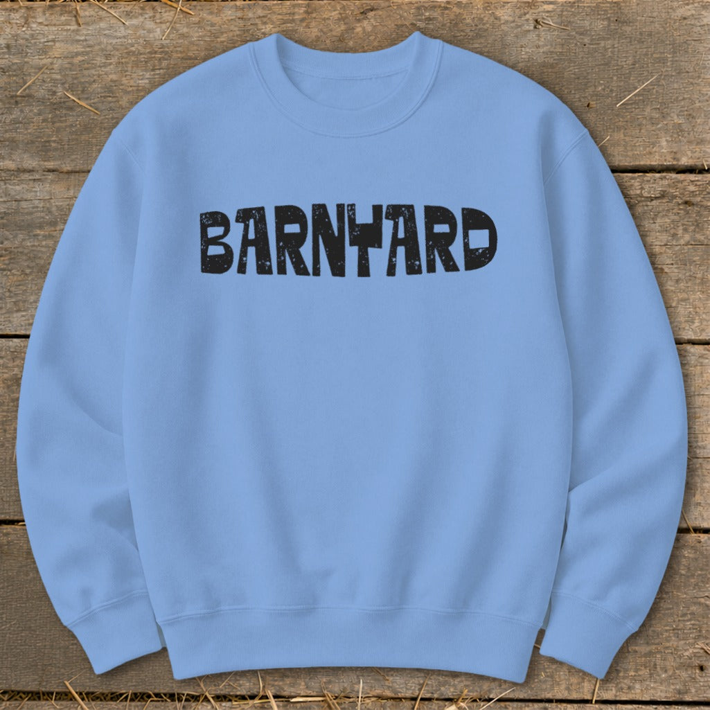 Light blue crewneck sweatshirt with the word Barnyard printed in distressed black text across the chest.