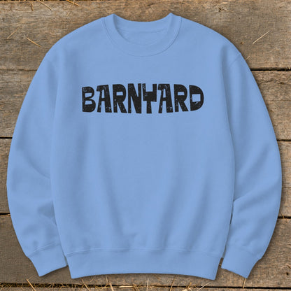 Light blue crewneck sweatshirt with the word Barnyard printed in distressed black text across the chest.