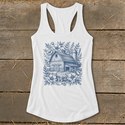 White tank top with blue barn and floral sketch design.