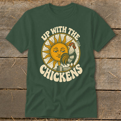 A dark green t-shirt displays a graphic of a rooster crowing before a smiling sun with text reading Up With The Chickens.