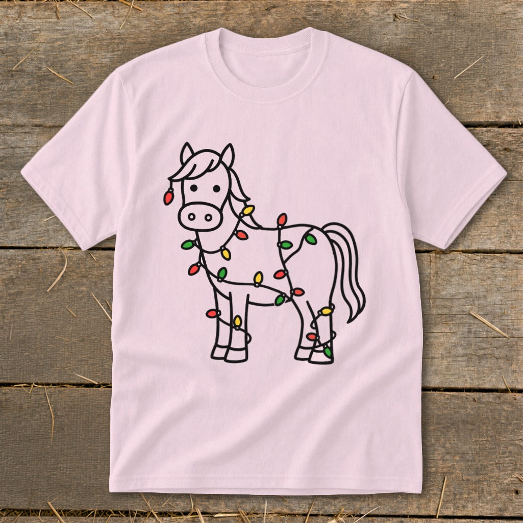 Pink t-shirt with a black outline drawing of a horse wrapped in colorful Christmas lights.