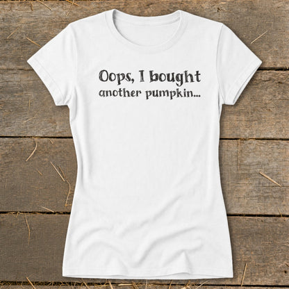 White t-shirt with black text "Oops, I bought another pumpkin..."