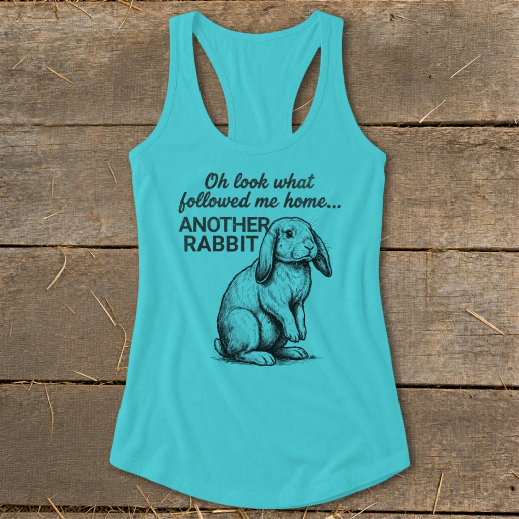 Turquoise tank top with a rabbit graphic and text reading "Oh look what followed me home... ANOTHER RABBIT".