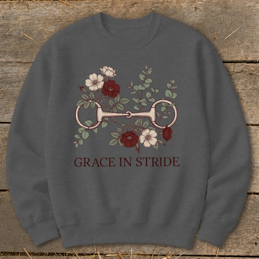 Dark grey sweatshirt with floral horse bit graphic and "Grace in Stride" text.
