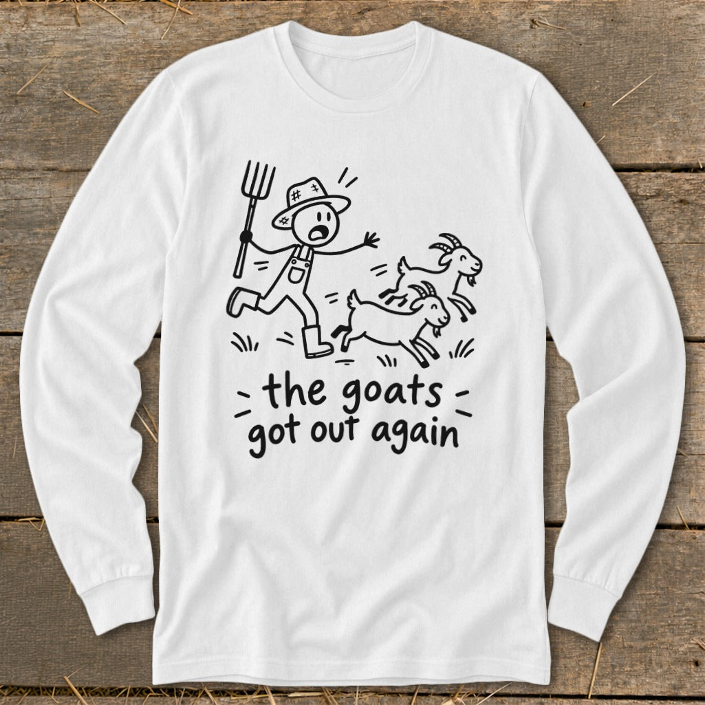 White long sleeve shirt with a stick figure farmer chasing two goats, text reads "the goats got out again".