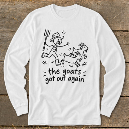 White long sleeve shirt with a stick figure farmer chasing two goats, text reads "the goats got out again".