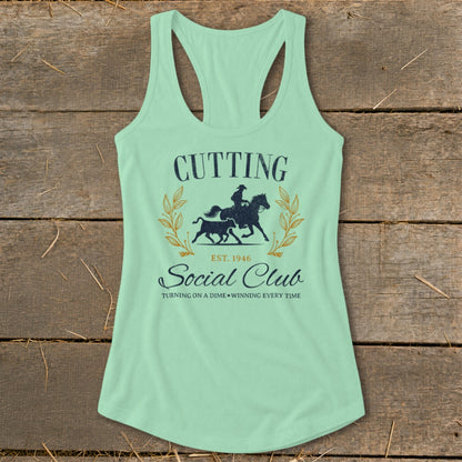 Mint green tank top with "Cutting Social Club" and a cowboy on horseback herding a steer.