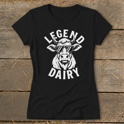 Black t-shirt with white graphic of a cow wearing sunglasses and text "LEGEND DAIRY".