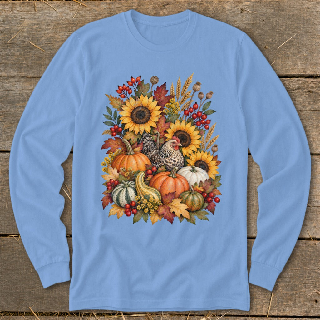 Light blue long-sleeve shirt with a fall harvest design featuring pumpkins, sunflowers, and a chicken.