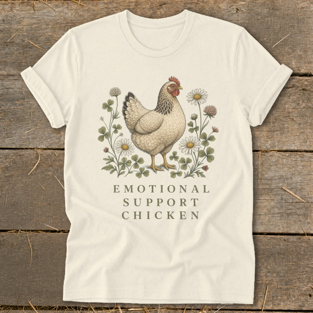Cream t-shirt with a hen illustration and text "Emotional Support Chicken".