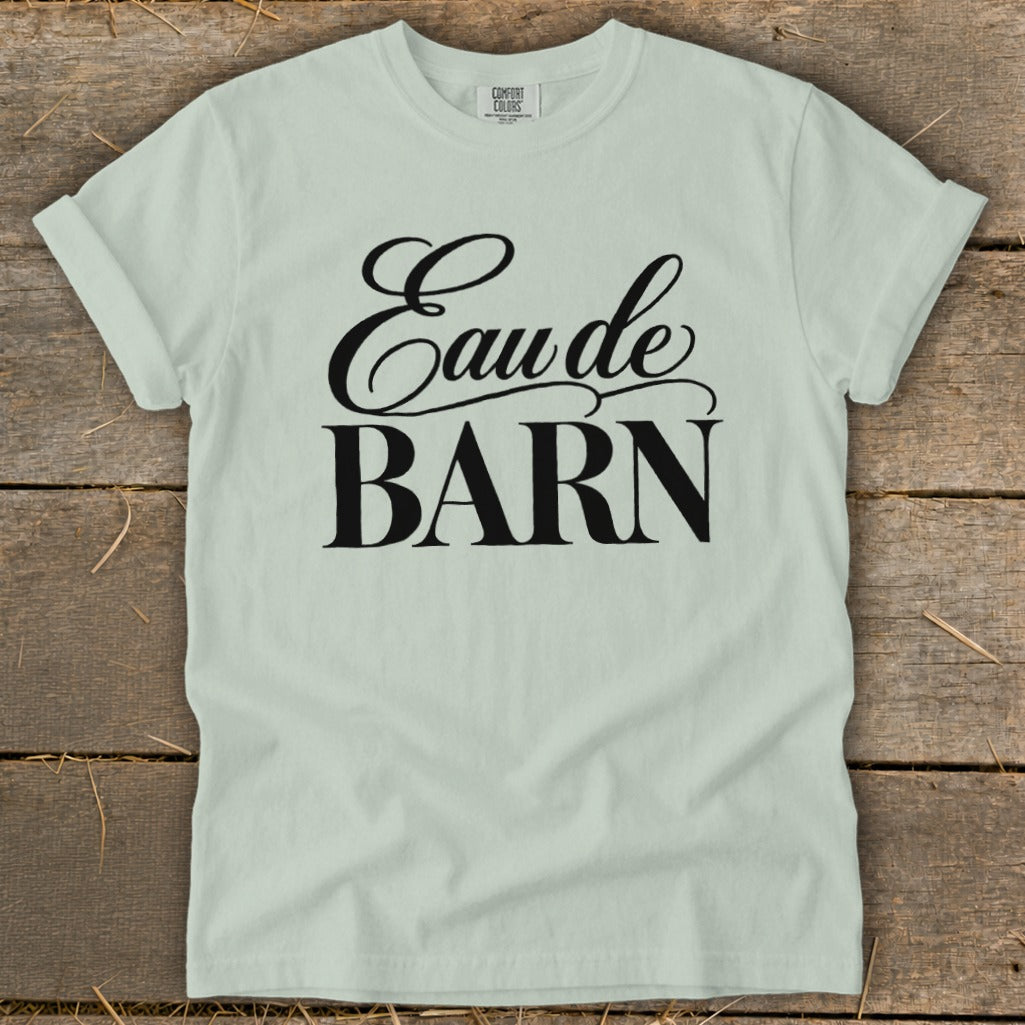 Light green t-shirt with black text that reads "Eau de BARN"