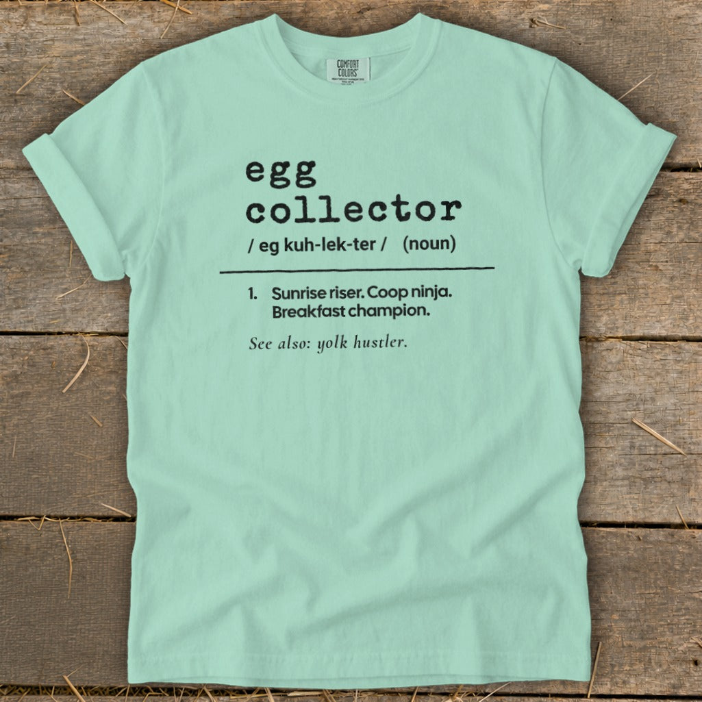 Light blue t-shirt with "egg collector" definition printed in black text.
