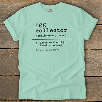 Light blue t-shirt with "egg collector" definition printed in black text.