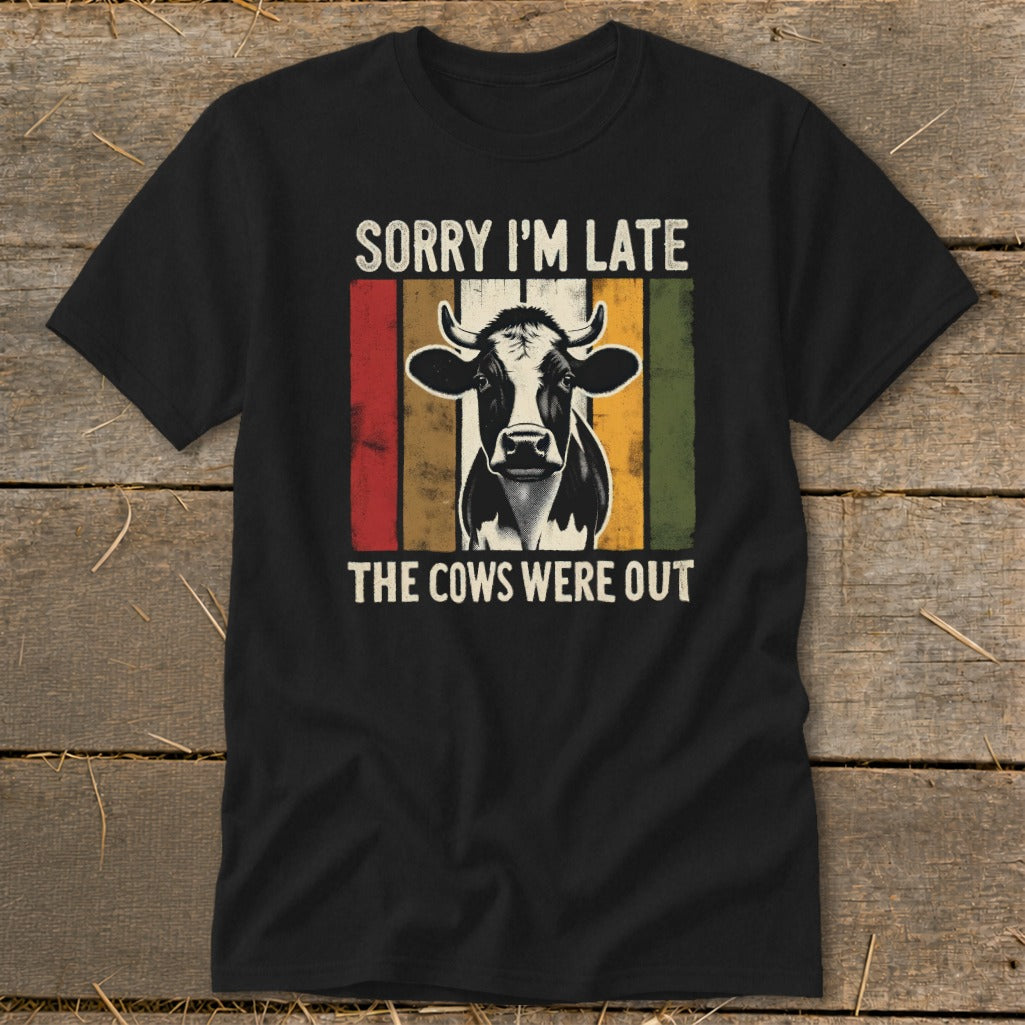 Black t-shirt with cow graphic and text: Sorry I'm late, the cows were out.