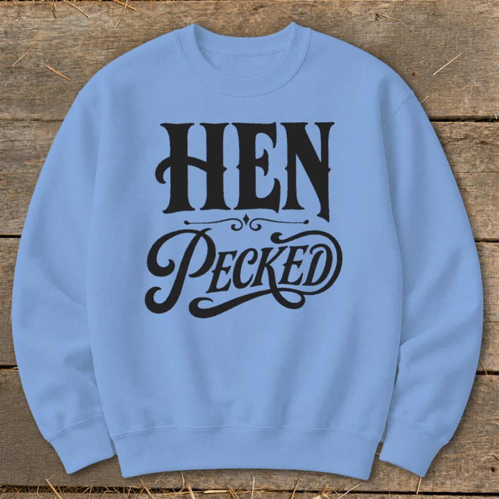 Light blue crewneck sweatshirt with black text "HEN PECKED" in decorative font.