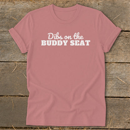 Dusty rose t-shirt with white text reading "Dibs on the BUDDY SEAT".