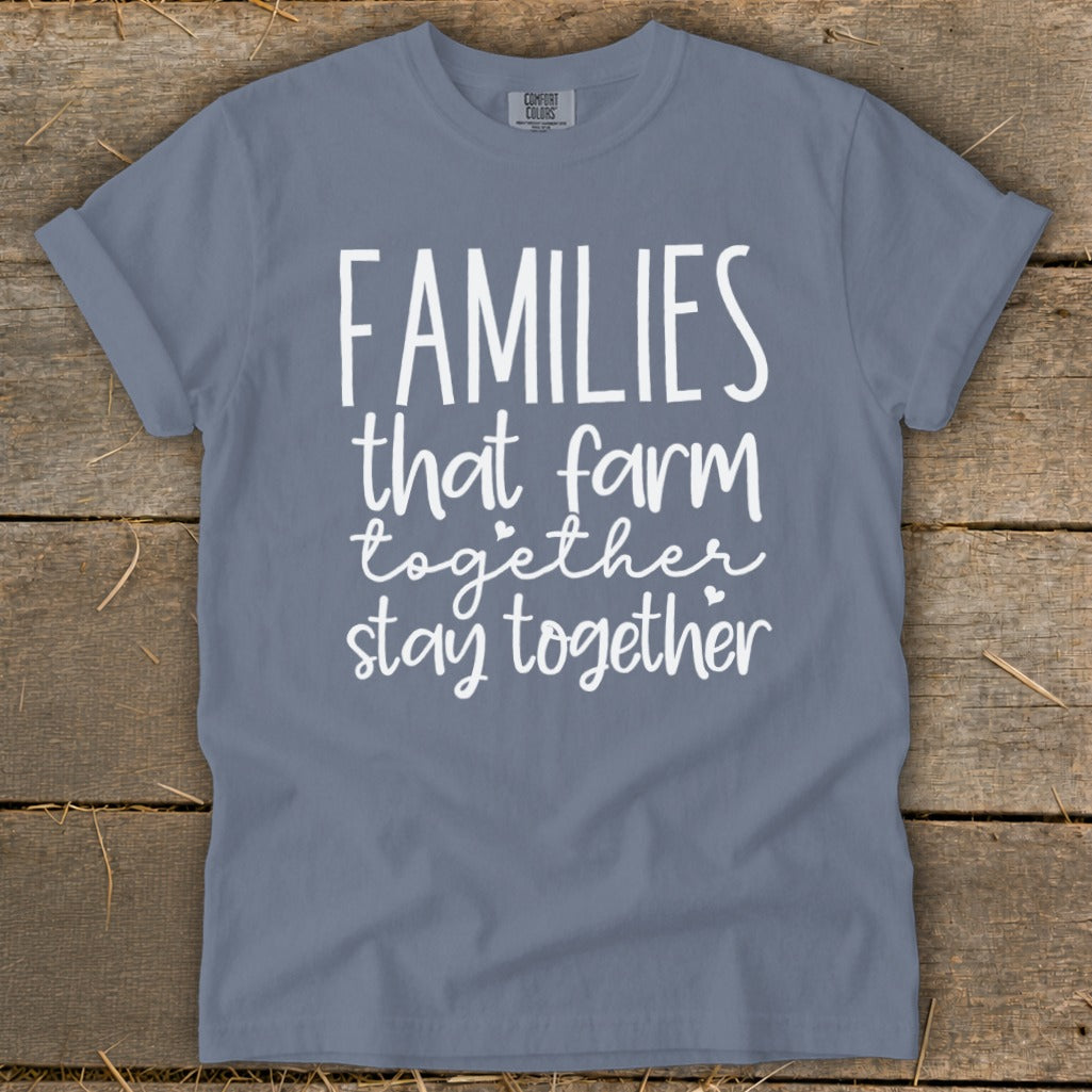 Blue t-shirt with white text reading "FAMILIES that farm together stay together".