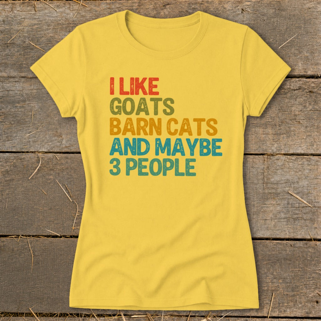 Yellow t-shirt with "I like goats barn cats and maybe 3 people" text.