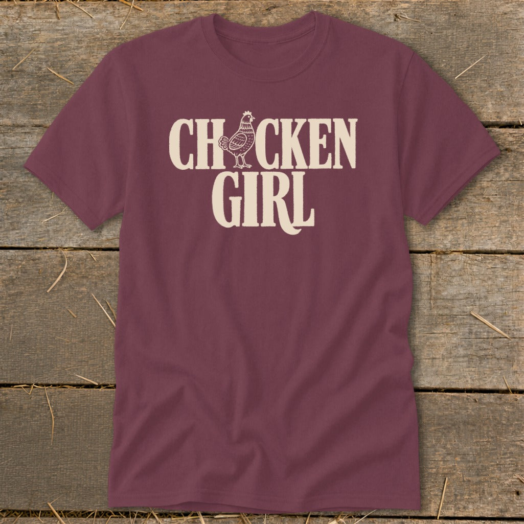 Maroon t-shirt with "CHICKEN GIRL" text and a chicken graphic.
