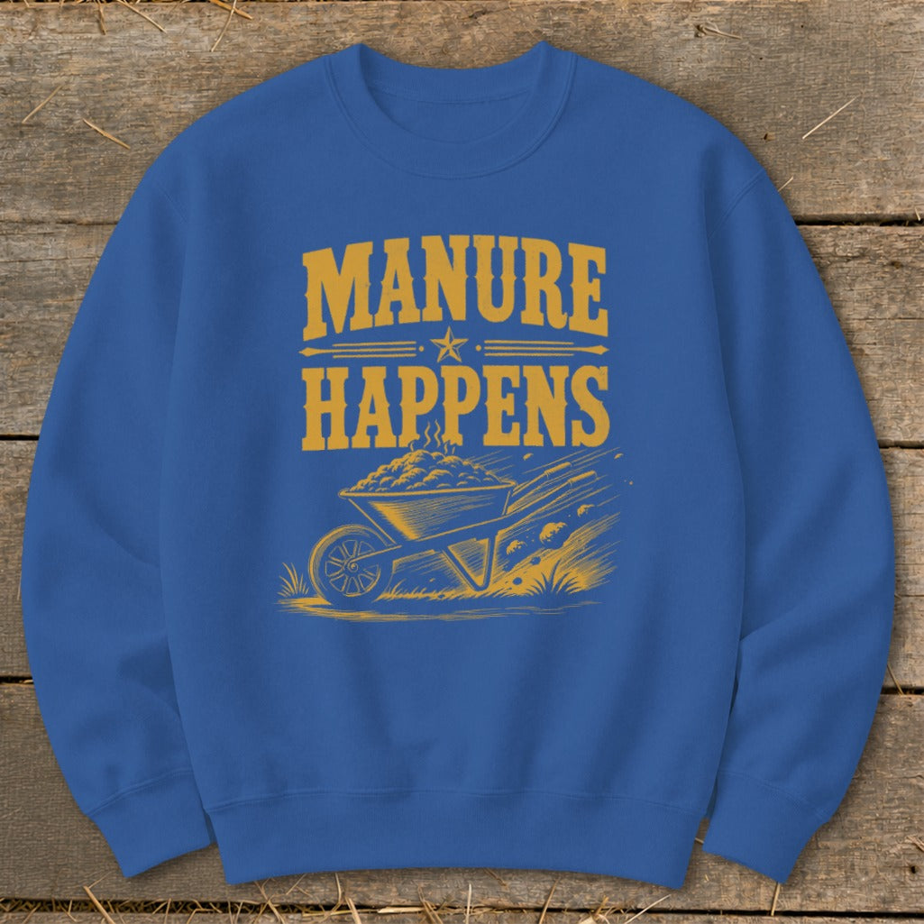 Blue sweatshirt with yellow text "MANURE HAPPENS" and a wheelbarrow graphic.