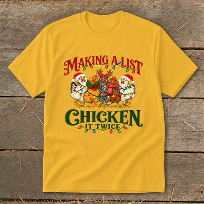 Yellow t-shirt with "Making a list chicken it twice" text and festive chickens.