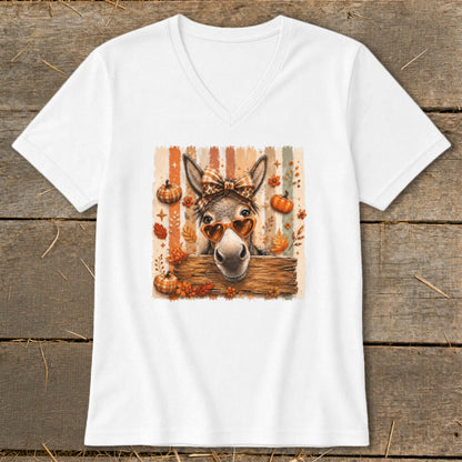 Donkey wearing heart sunglasses and bow with fall pumpkins and leaves graphic on shirt.