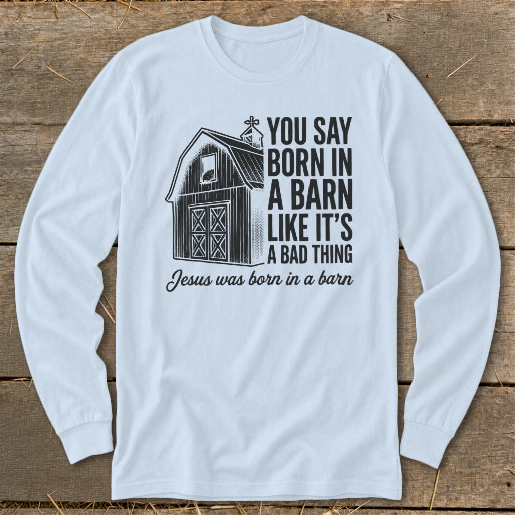 Light blue long-sleeve shirt with barn graphic and text.