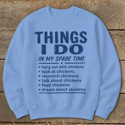 Light blue sweatshirt with "Things I Do In My Spare Time" and chicken-related activities.