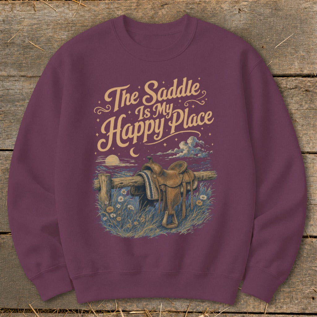 Maroon sweatshirt with "The Saddle Is My Happy Place" text and western saddle graphic.