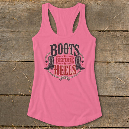 Pink racerback tank top with "Boots Before Heels" and cowboy boot graphic.