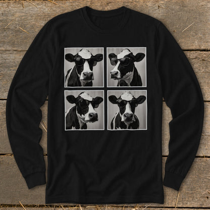 Four black and white cows wearing sunglasses in a grid on a black long-sleeve shirt.