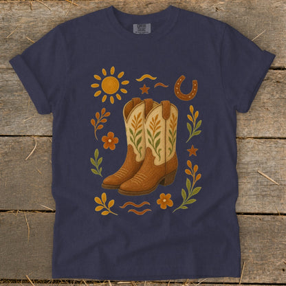Navy t-shirt with western cowboy boots, sun, horseshoe, and floral graphic.