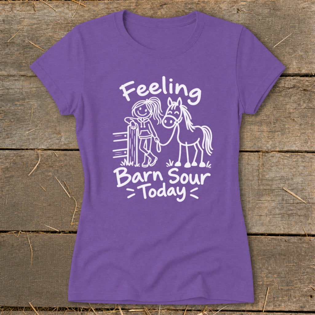 Purple t-shirt with white graphic of girl and horse with text "Feeling Barn Sour Today".