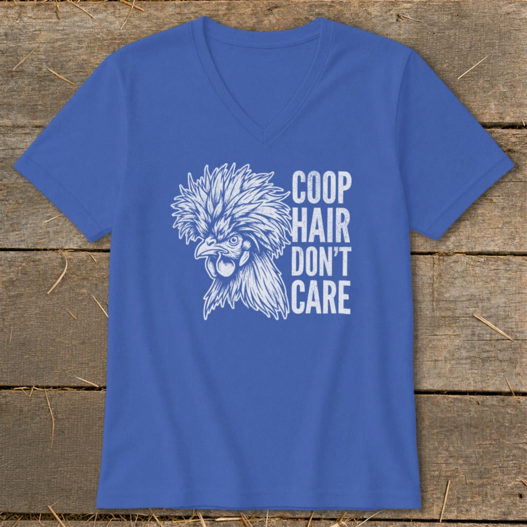 Blue t-shirt with a white illustration of a fluffy chicken and the text "COOP HAIR DON'T CARE".
