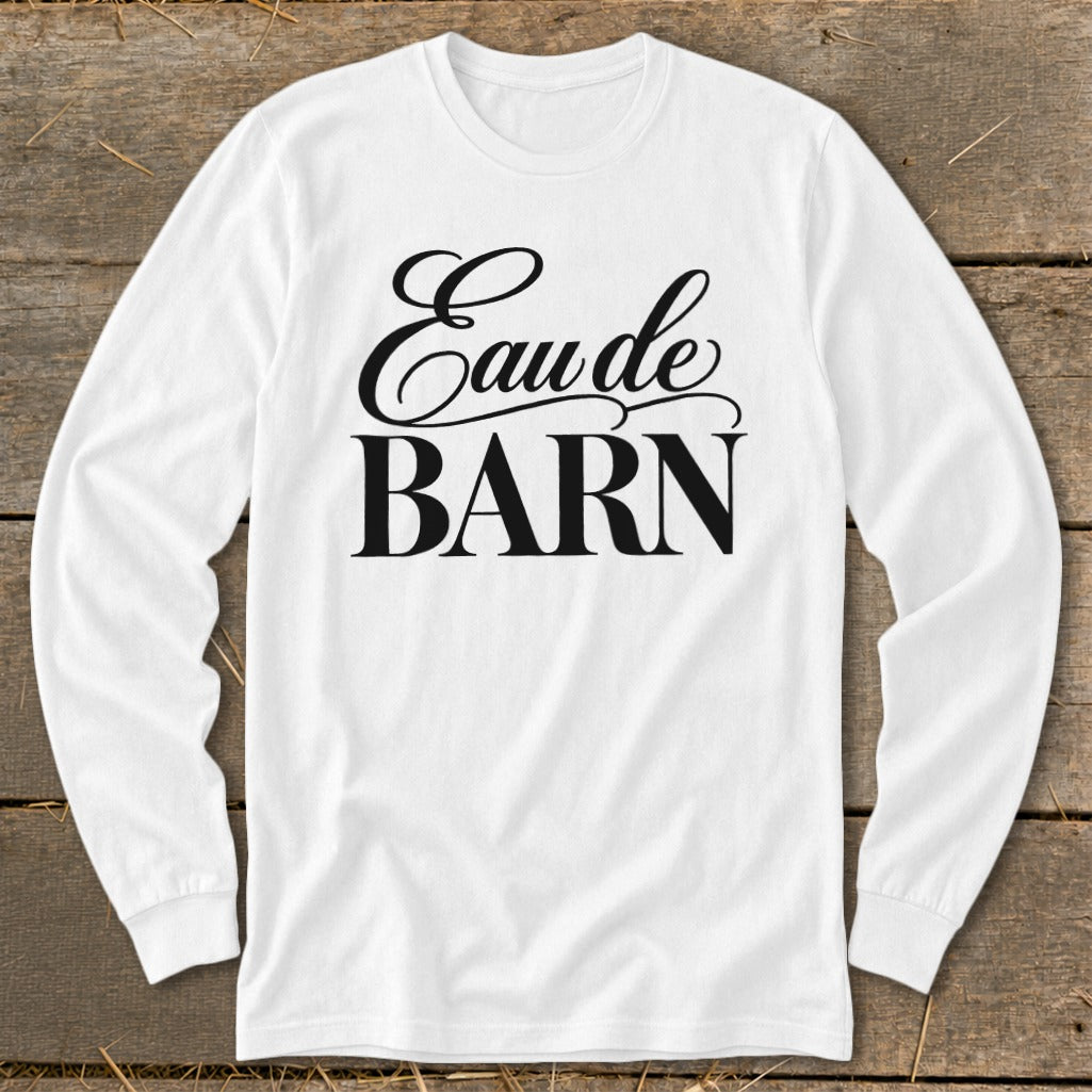 White long sleeve shirt with black text "Eau de BARN"