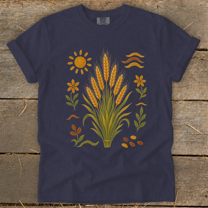 Navy t-shirt with a wheat stalk, sun, flowers, and seed graphic.