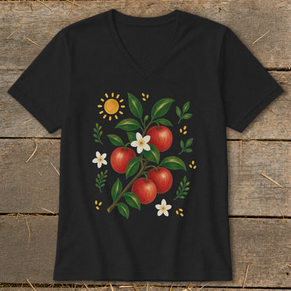 Black t-shirt with a watercolor illustration of apples on a branch, surrounded by flowers and a sun.