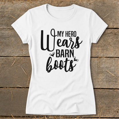 White t-shirt with black text that reads "My Hero Wears Barn Boots".