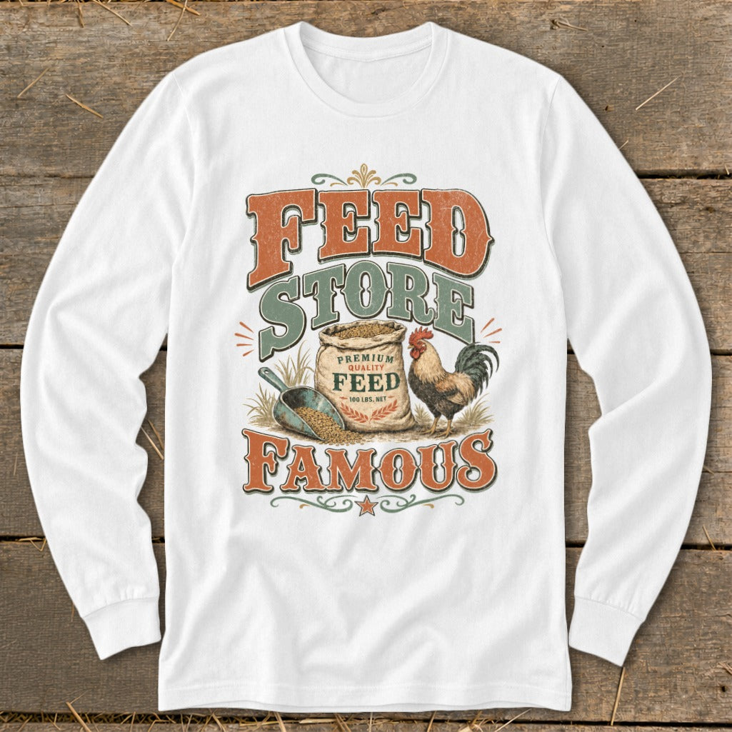 White long-sleeve shirt with "Feed Store Famous" graphic, a rooster, and feed bag.