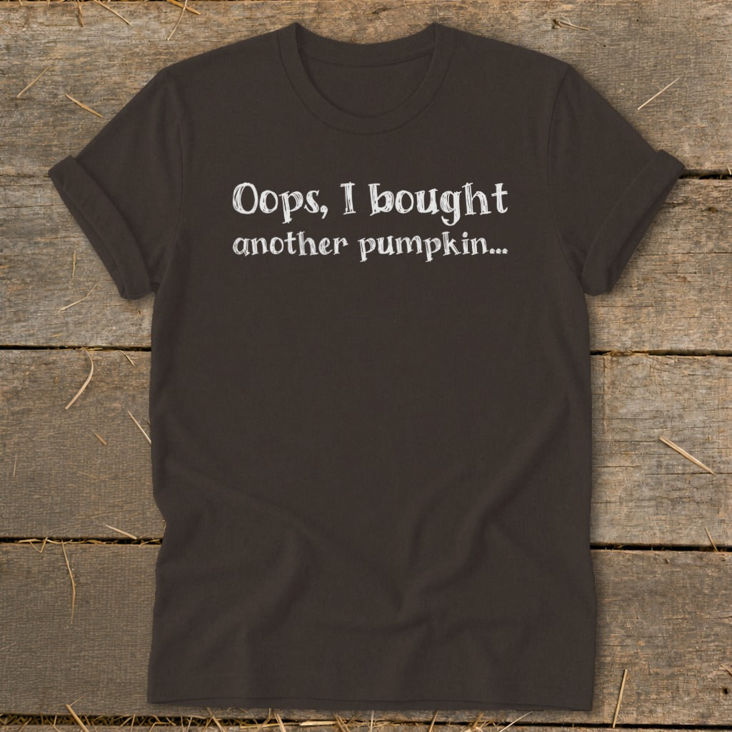 Dark brown t-shirt with white text: "Oops, I bought another pumpkin..."