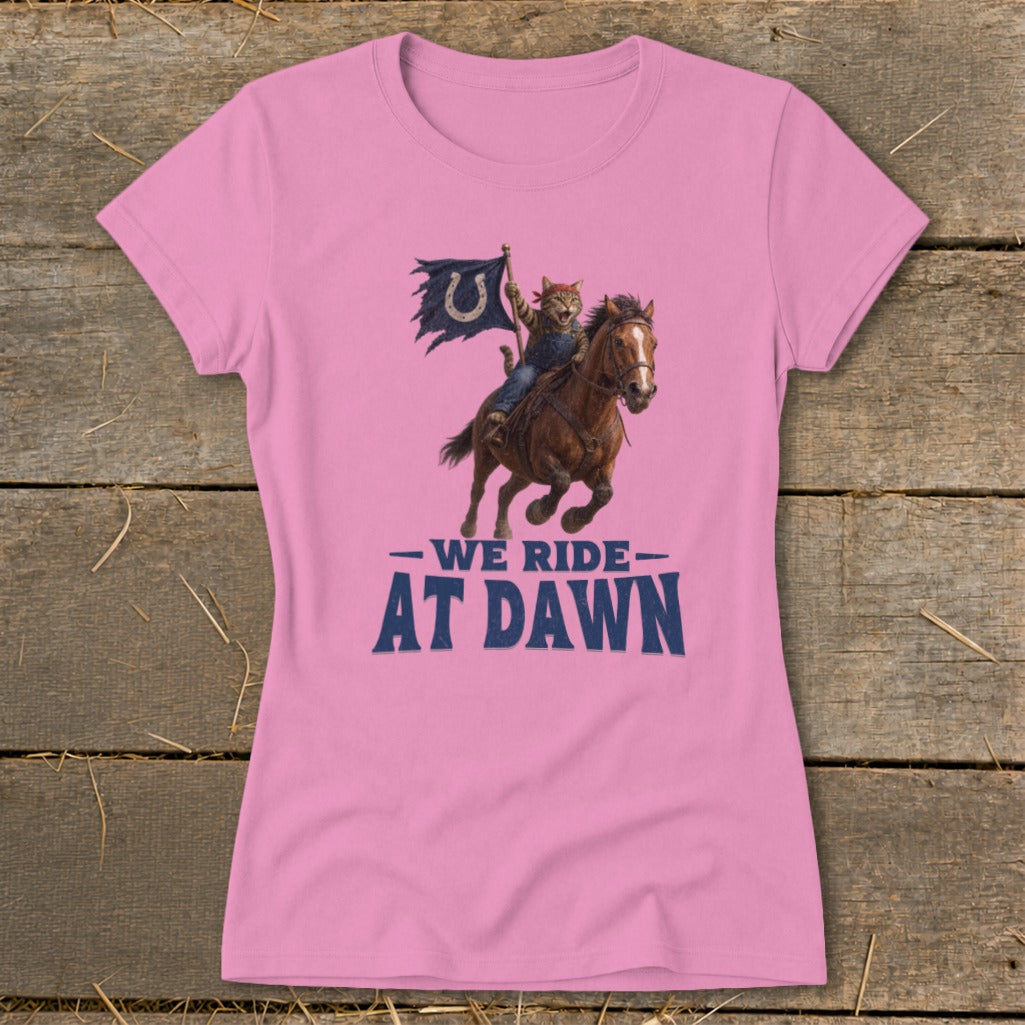 Pink t-shirt with cat riding horse, holding horseshoe flag, "We Ride At Dawn" text.