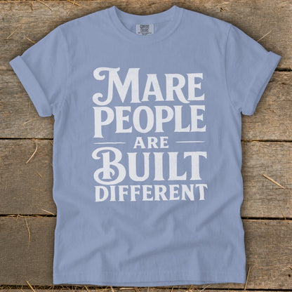 Light blue t-shirt with white text reading "MARE PEOPLE ARE BUILT DIFFERENT".