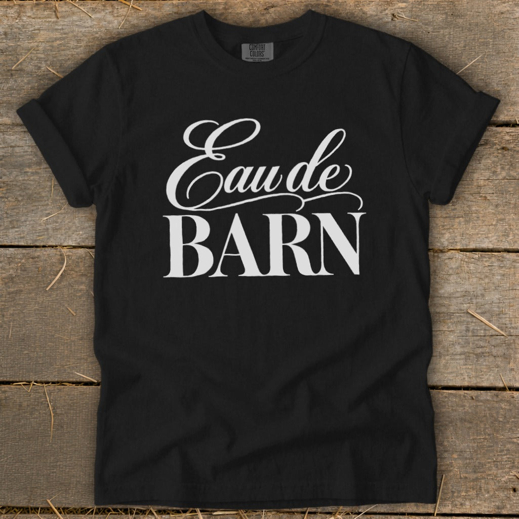 Black t-shirt with white text reading "Eau de BARN"