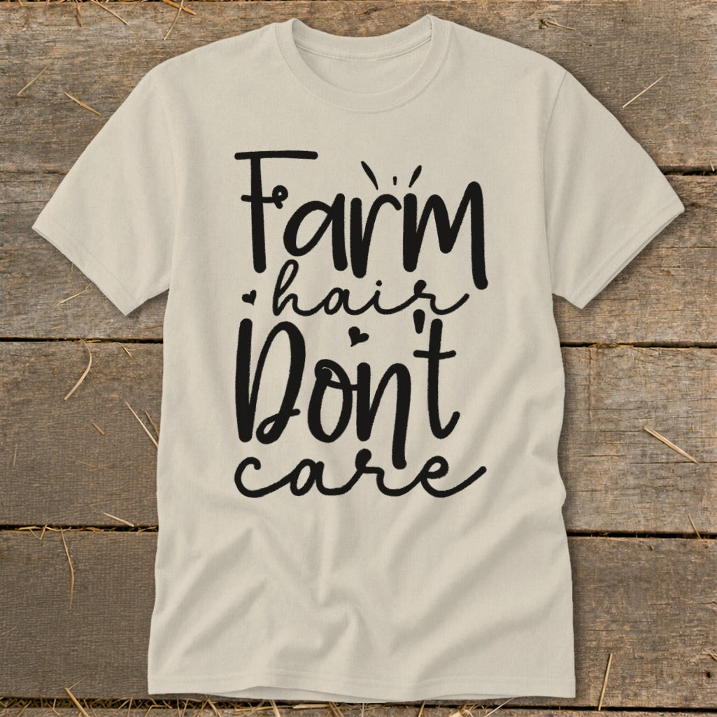 Light beige t-shirt with black text reading "Farm hair Don't care."