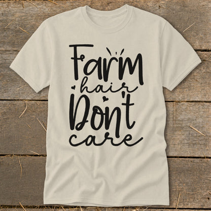 Light beige t-shirt with black text reading "Farm hair Don't care."