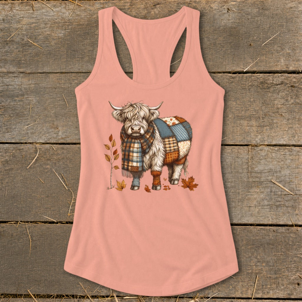 Peach tank top with Highland cow wearing a plaid scarf and patchwork coat.