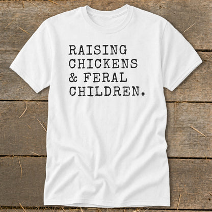 White t-shirt with black text that reads "RAISING CHICKENS & FERAL CHILDREN."