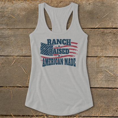 Grey tank top with distressed American flag and text "Ranch Raised American Made."