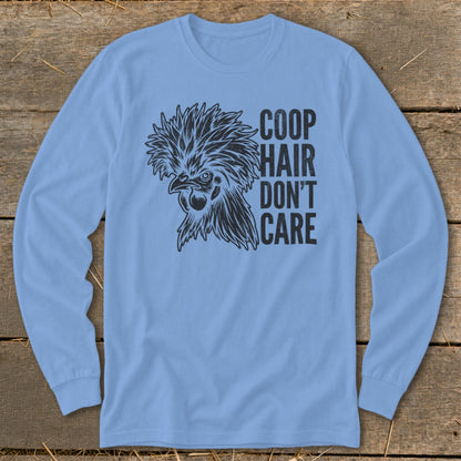 Light blue long sleeve shirt with black graphic of a chicken and text "COOP HAIR DON'T CARE".