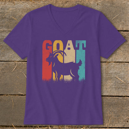 Purple v-neck t-shirt with retro goat graphic and colorful stripes.